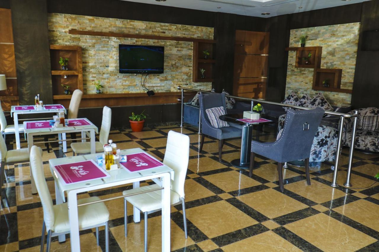 Diyafat Al Saada Serviced Apartments - Ishbillia リヤード エクステリア 写真